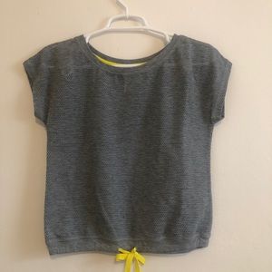 Mesh workout top with yellow pull strings